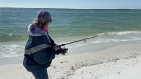 Big redfish! Janis lands a monster on Crooked Island.